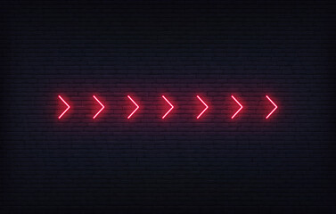Obraz premium Neon arrow sign. Set of red futuristic glowing neon arrow pointer on brick wall background