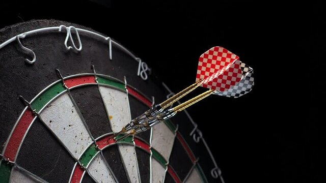 Three darts hit the tripling of sector 20 on the Dartboard. 180 points with three darts. 