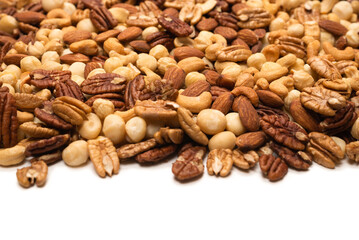 Mix of nuts isolated on white background. Top view.