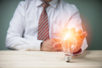 Creative new idea for development innovation, brainstorming for a solution. Businessman touch light...