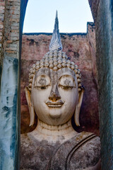 The Great Mara Buddha image at Wat Si Chum, known as `Phra Achana` is one of the ancient religious sites in the area of ​​Sukhothai Historical Park, Thailand.