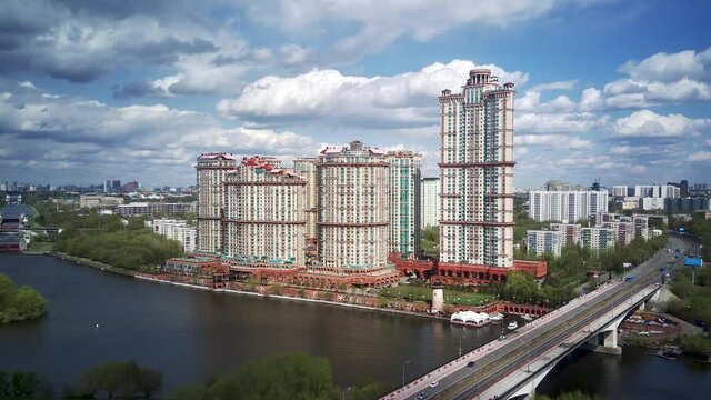 Amazing high angle top drone view on Strogino and Shchukino	district which are situated in beautiful green river park.
