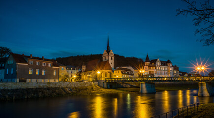 Night view of the ancient castle by the river