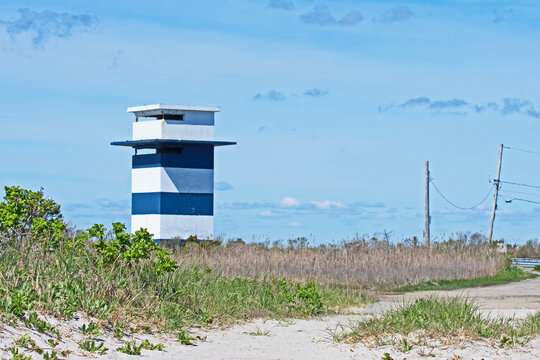 A tower, used by lifeguards, watches over West Island Town Beach in Fairhaven, Massachusetts.