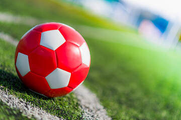 Leather soccer ball on the football pitch