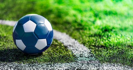 Leather soccer ball on the football pitch