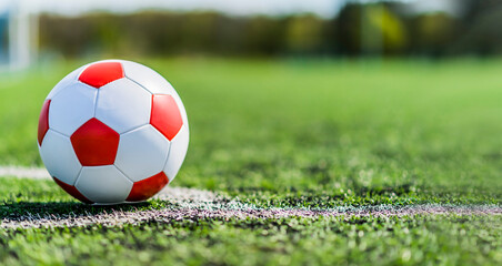 Leather soccer ball on the football pitch