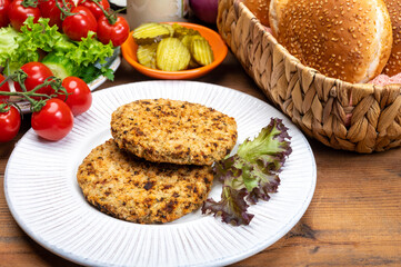 Making vegetarian hamburgers with round patties or burgers made from grains, vegetables and legumes