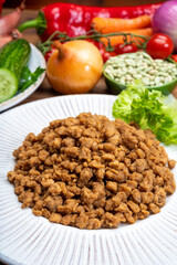 Vegetarian minced meat imitation made from grains, soybeans, vegetables and legumes