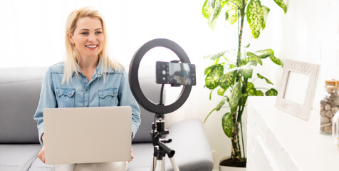 Female Vlogger Recording Broadcast At Home