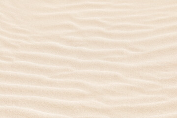 Fototapeta na wymiar Abstract irregular pattern in white sand on beach. Textured summer background.