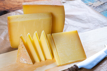 Cheese collection, French comte and Swiss gruyere cheeses