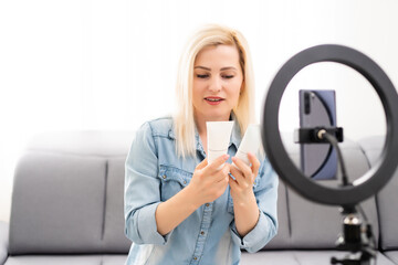 Female Vlogger Recording Broadcast At Home