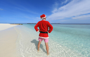 portrait of Santa Claus on a tropical island