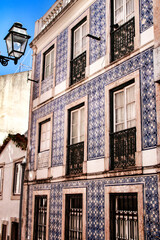 Obraz premium Narrow and colorful streets, facades and balconies of Lisbon