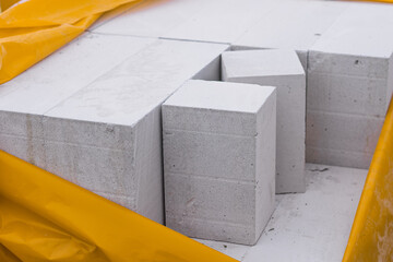 Building gas block for building a house folded in branded packaging