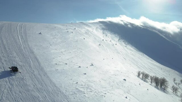 Ratrak. Ratrak lifts skiers to the top of Mount Gemba. Aerial view.