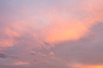 Colourful pink sky with clouds at golden hour. Basque Coast of France.