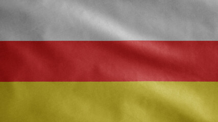 Ossetian flag waving in the wind. South Ossetia banner blowing soft silk.
