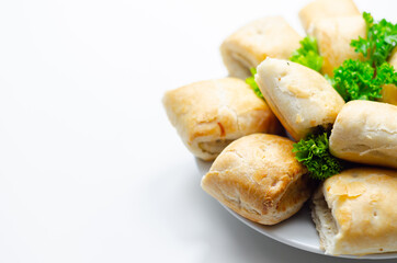 Cocktails sausage rolls, seasoned pork sausage meat wrapped in puff pastry