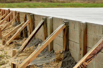 A snapshot of the slab foundation formwork created from planks.