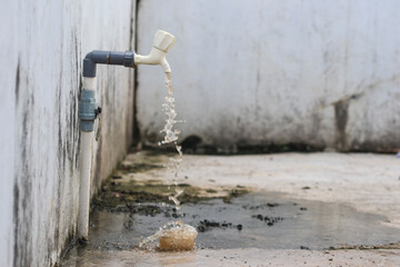 Water comes out of the faucet