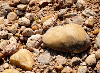 Fototapeta na wymiar Different size rocks on the ground