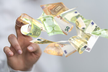 bill euro banknote in hand rain