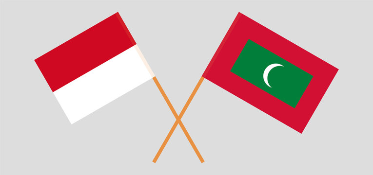 Crossed flags of Monaco and Maldives. Official colors. Correct proportion