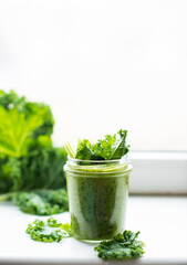 Green detox cocktail with cale salad, vegetarian healthy smoothie in a jar
