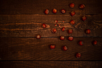 hazelnuts on the wooden background