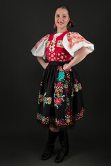 Young beautiful slovak woman in traditional dress. Slovak folklore