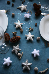 christmas table setting with stars hollidays decoration