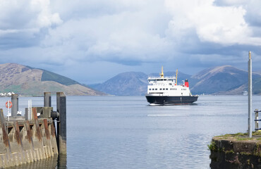 Ferry ship arriving at Scottish island of Rothersay