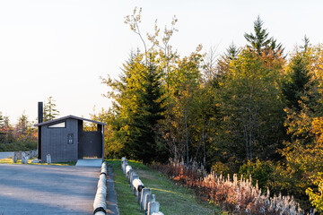 Rest stop area with empty parking lot by roadside of Highland scenic highway road at West Virginia Monongahela national forest mountains overlook in autumn fall with foliage © Kristina Blokhin
