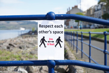 Social distancing sign to stay safe on Scottish island Rothesay