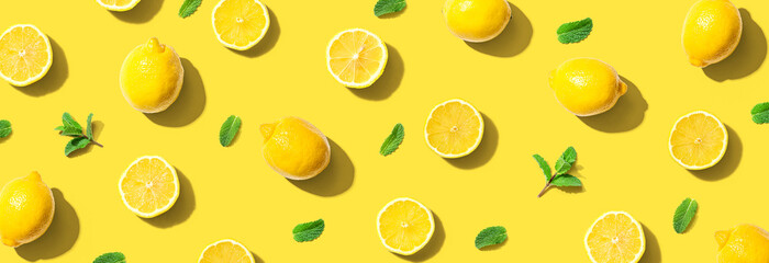 Fresh yellow lemons with mints overhead view