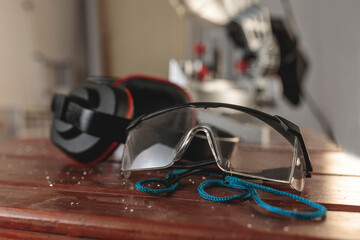 Detailed plan of work safety items. Safety glasses and safety ear muffs
