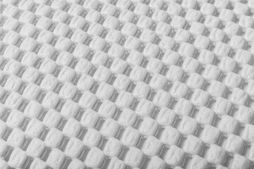 White background from cubes. Texture pattern from white cubes. Polymer surface.