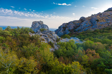 Summer mountain landscape: 681m Ilyas-Kaya and Sun Temple. View of Cape Aya, near Laspi, Crimea,
