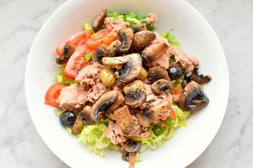 top view of a mix salad with seafood
