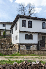 Typical street and old houses at historical village of Bozhentsi,  Bulgaria