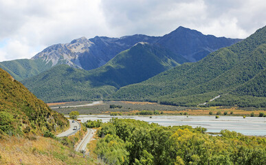 Fototapeta na wymiar Road and rail track - Arthurs Pass National Park, New Zealand