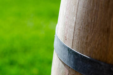 Naklejka premium Wine: detail of a wooden barrel, precious woods are always used to age the wine.