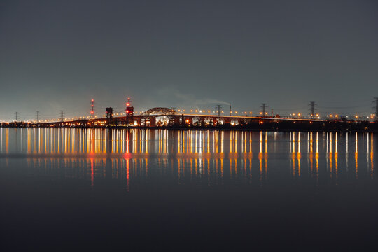 Beautiful shot of colorful bridge lights reflection on the water