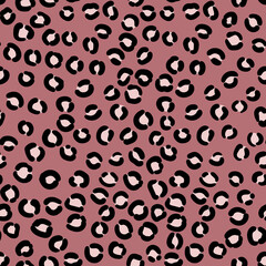Abstract modern leopard seamless pattern. Animals trendy background. Pink and black decorative vector stock illustration for print, card, postcard, fabric, textile. Modern ornament of stylized skin