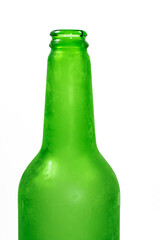 top of a cloudy green beer bottle on a white background close-up
