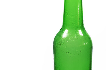 the top of a cloudy frozen green beer bottle on a white background