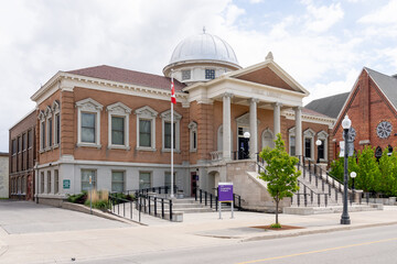 

Brantford, On, Canada - May 8, 2021: Carnegie Library Building in Brantford, On, Canada. Carnegie building was designed in the Beaux Arts style and was constructed between 1902 and 1904.
 - obrazy, fototapety, plakaty