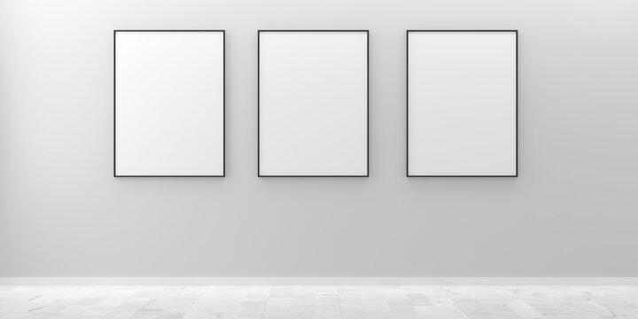 Three white empty blank picture or poster frames template mock up design hanging on white wall and wooden floor background in room with black frame
